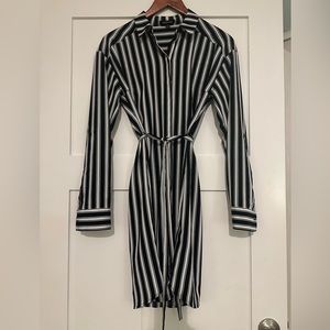 Black and white striped shirt-dress with belt.
